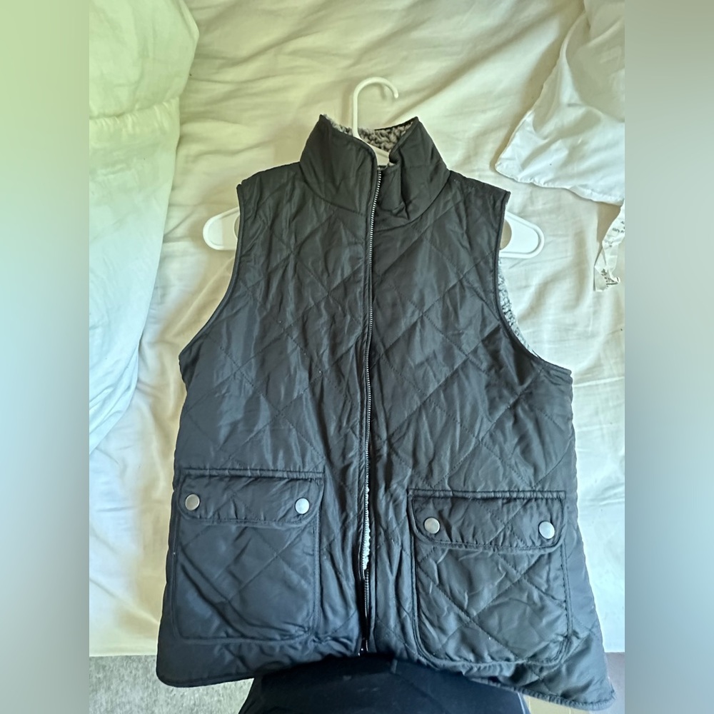 Black reversible vest